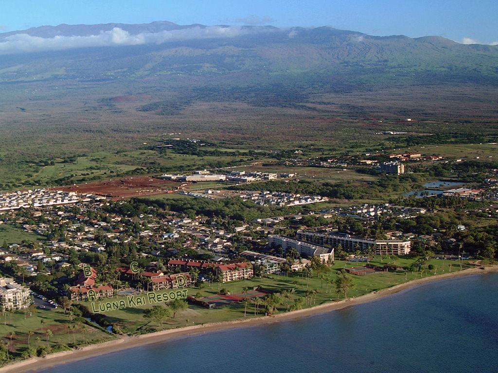 Luanakai buildings and Beach Park with Majestic Haleakala